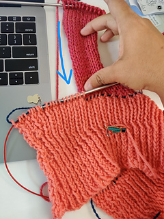The shoulder stitches for right shoulder were picked from outermost strip of the saddle to the neck band. 