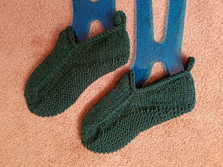 Pair#3- women's 9 5/8" long with 8.5" sole.