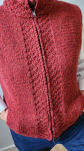 BT Quarry (aran weight). The cables didn't present well with the yarn, so she worked a double moss. 