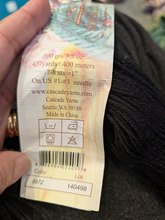 Sarah's lable (solid black yarn).