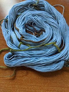 Hanked and washed yarn.  Looks like enough for a doily!
