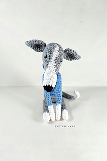 Whippet amigurumi version in gray with blue fake sweater with embroidery eyes.