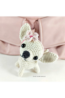 Includes crochet flower accessory option for customization.