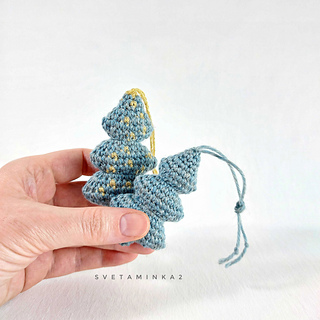 Handmade crochet Christmas trees, created from a crochet pattern for unique gifts in no time.