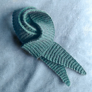 Made with 40gm possum/wool blend fingering weight yarn on 2.75mm needles.
