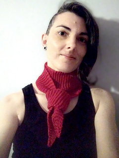 Made with 50gm acrylic sport weight yarn on 3.25mm needles. Easily wraps twice around the neck with length to tie.