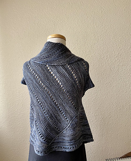 Size medium, shown on a 34” bust dress form.