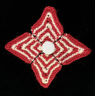 Same pattern, same needles with FOUR petals unblocked with Kroy Socks yarn