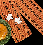 A couple of plain garter stitch rows at each end keeps the eyelets under control.