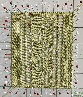 I pinned the interior of my swatch to straighten the eyelet columns a bit while blocking.